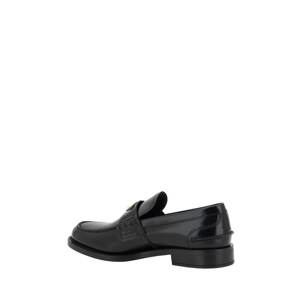 Prada Black Leather Logo Loafers - Élégance Sélective
